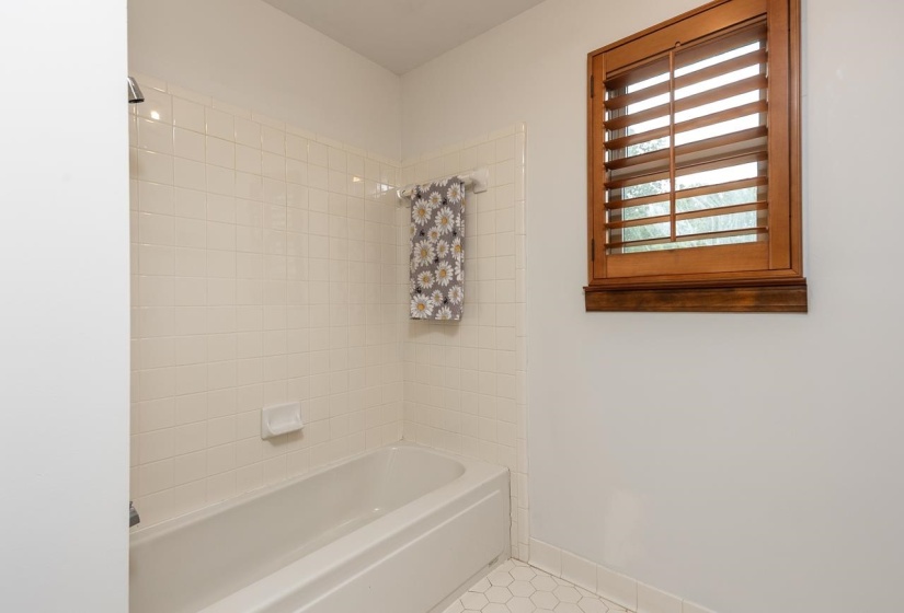 Full bath featuring bathing tub / shower combination and tile patterned flooring - upstairs bathroom
