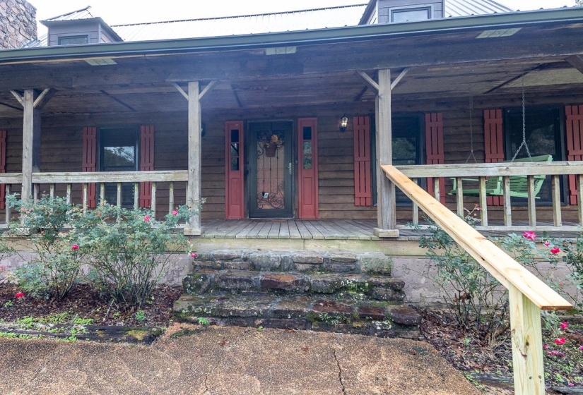 Enjoy the country life on your front porch. Beautiful new unbreakable exterior doors at every entrance.