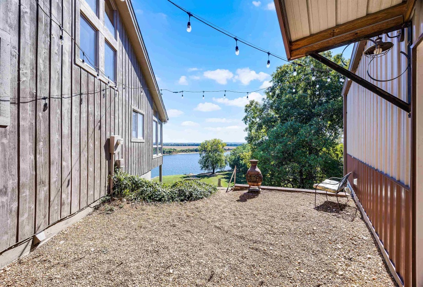 View of yard with a water view