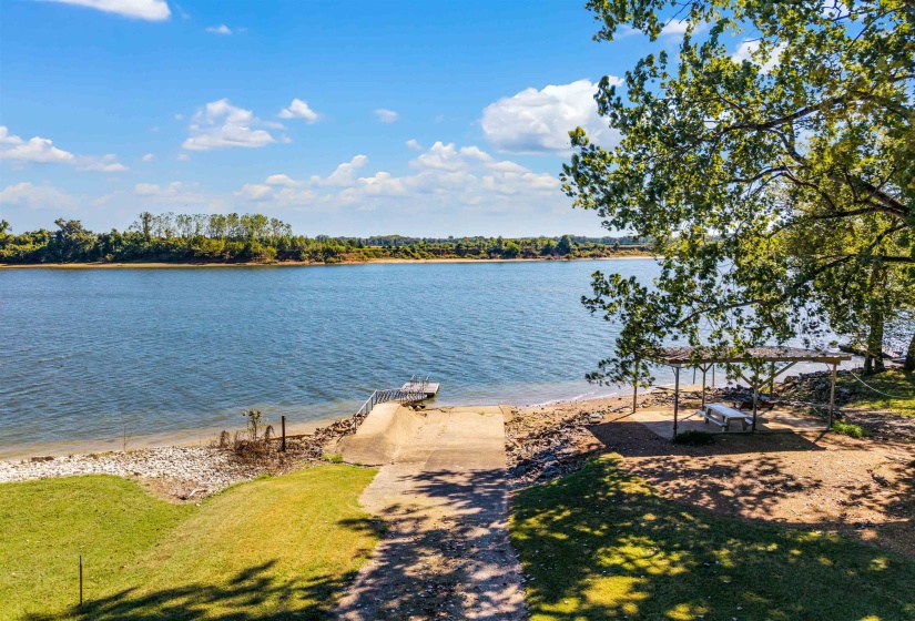 Water view featuring a boat ramp and a boat dock