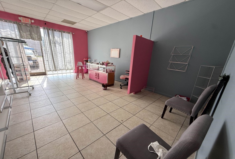 Sitting room featuring a drop ceiling
