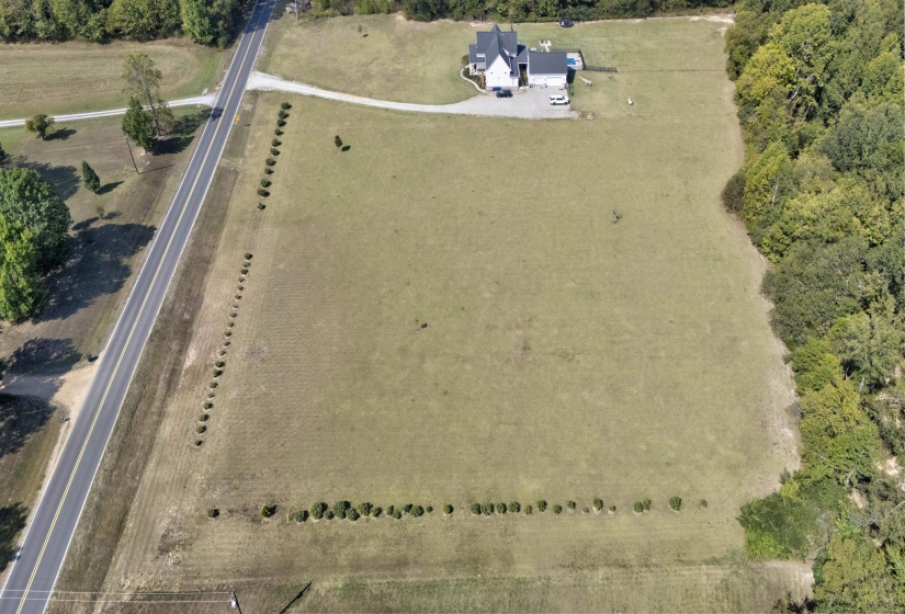 Aerial overview of property's location featuring rural landscape