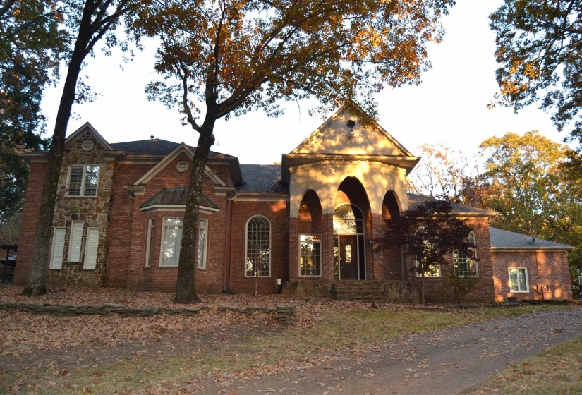View of front of property featuring brick siding