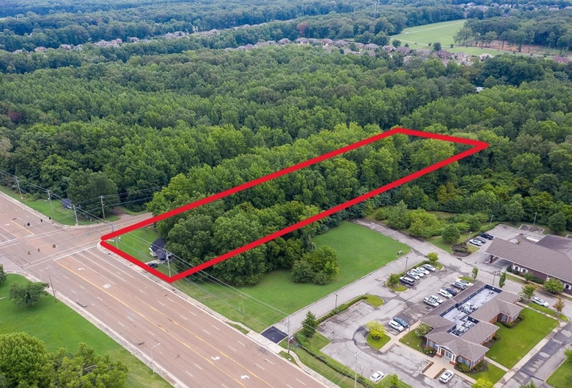 Aerial view of property's location featuring property parcel outlined