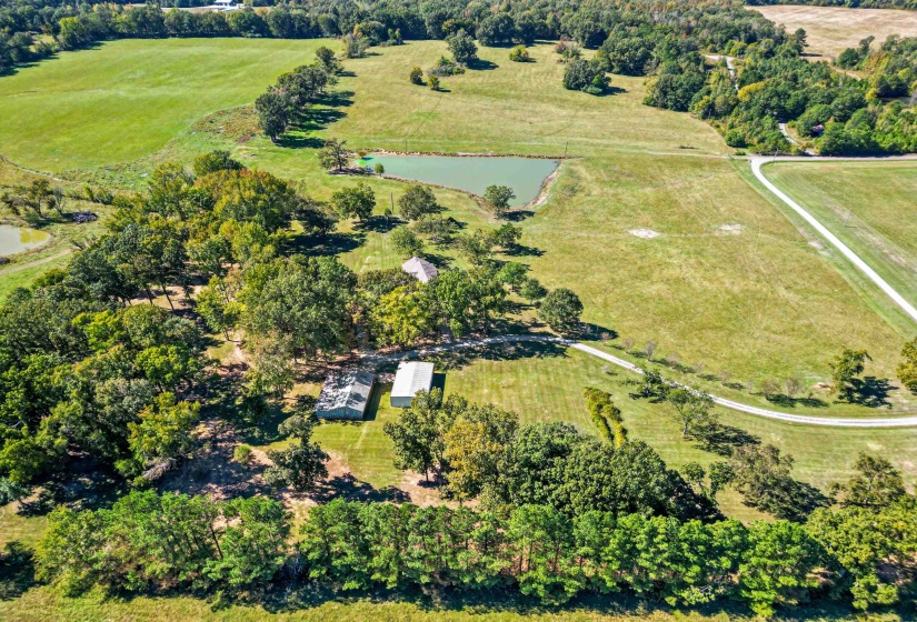 From every angle, this property tells a story of space and serenity. The mix of open meadows and tree-lined edges creates a versatile landscape perfect for outdoor living. A rare opportunity to own this much beauty and privacy in Rossville.