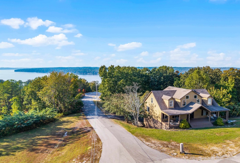 View from above of property with a nearby body of water
