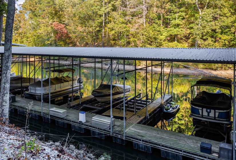Dock with a balcony and boat lift