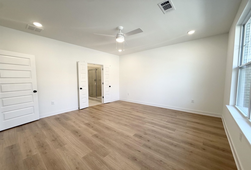 Unfurnished bedroom featuring recessed lighting, wood finished floors, and ceiling fan