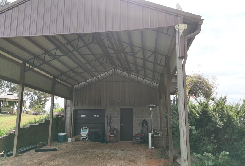 View of parking with a garage
