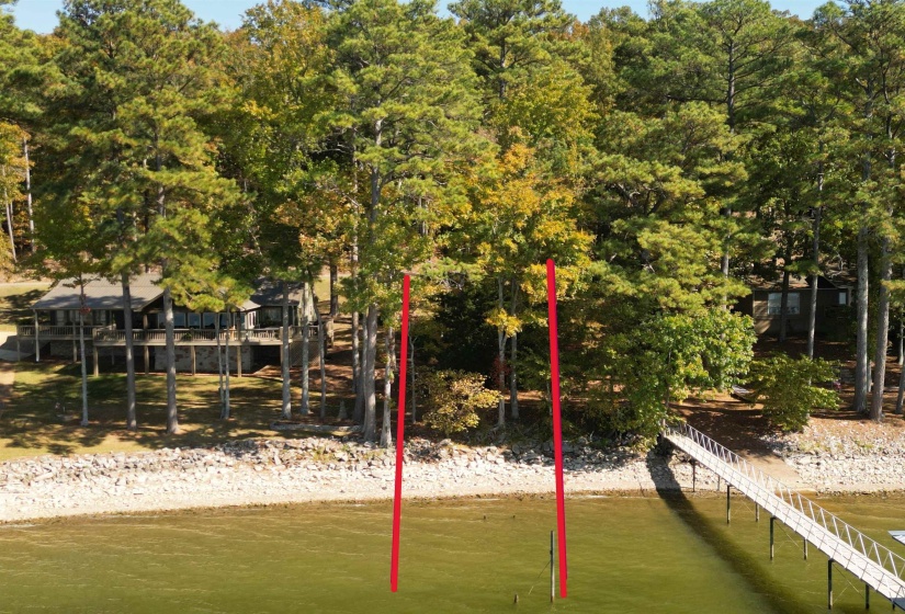 View of play area featuring view of water and beach
