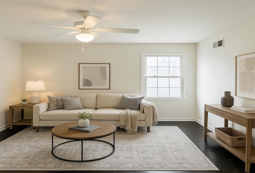 Living room with dark wood-style flooring, a ceiling fan, and baseboards