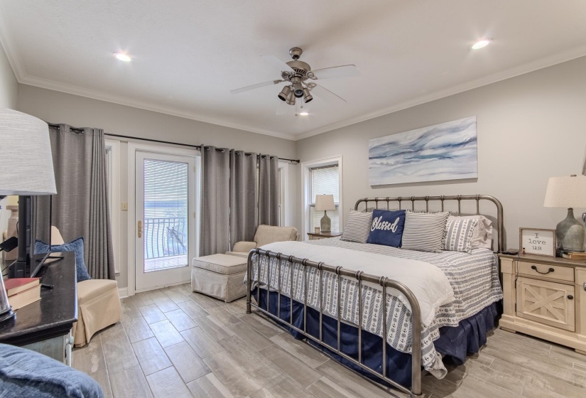 Bedroom featuring crown molding, light wood-style flooring, access to exterior, ceiling fan, and recessed lighting