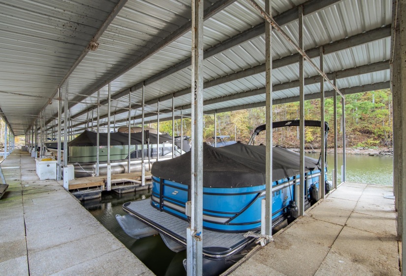 Dock featuring a water view and boat lift