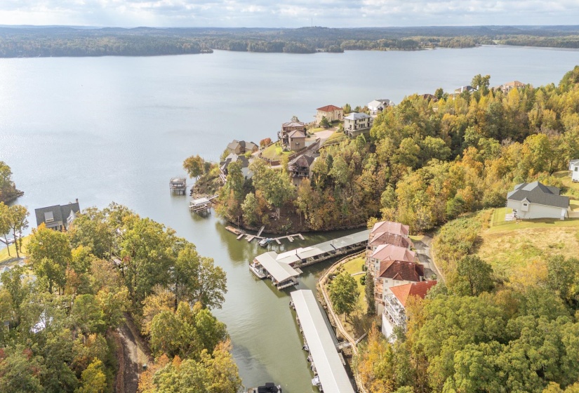 Aerial overview of property's location with a nearby body of water