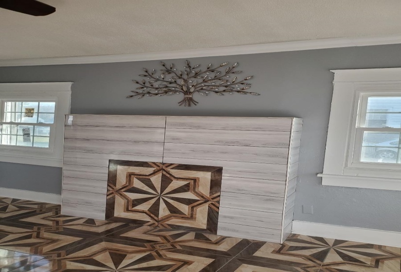 Details featuring parquet flooring and crown molding