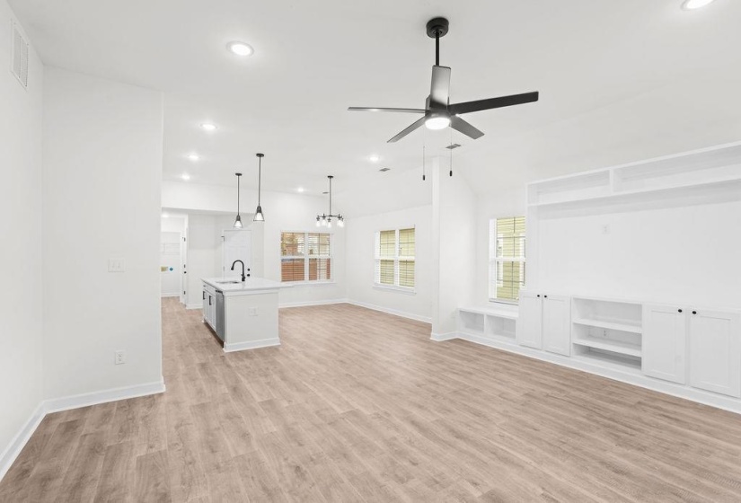 Unfurnished living room featuring recessed lighting, light wood-type flooring, and a ceiling fan