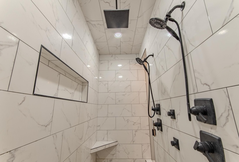 Bathroom with tiled shower