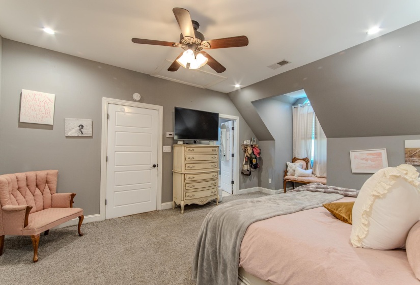 Bedroom featuring carpet flooring, a ceiling fan, lofted ceiling, and recessed lighting