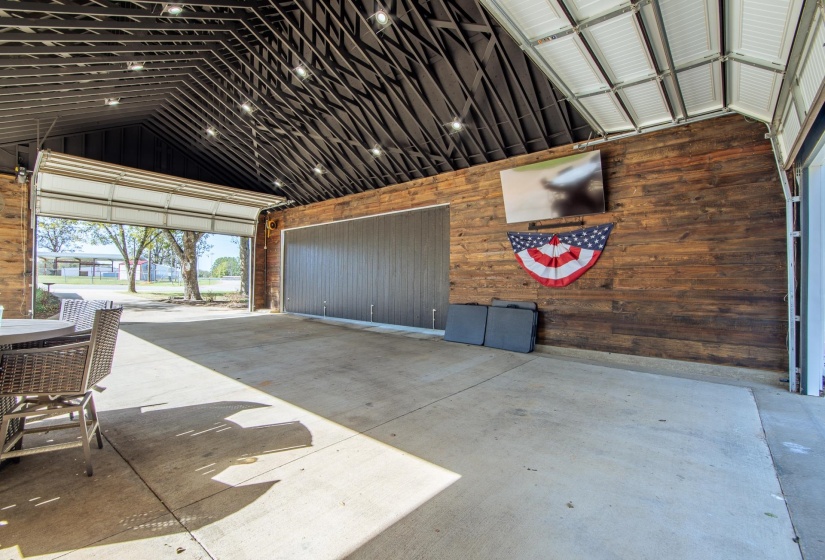 Garage featuring wooden walls