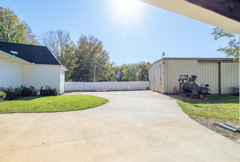 View of patio / terrace with an outdoor structure and an outbuilding