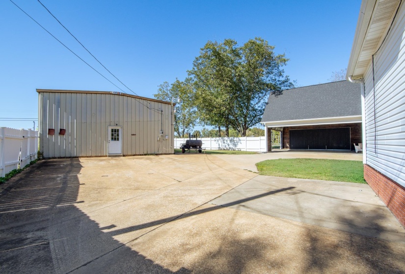 View of patio / terrace with concrete driveway