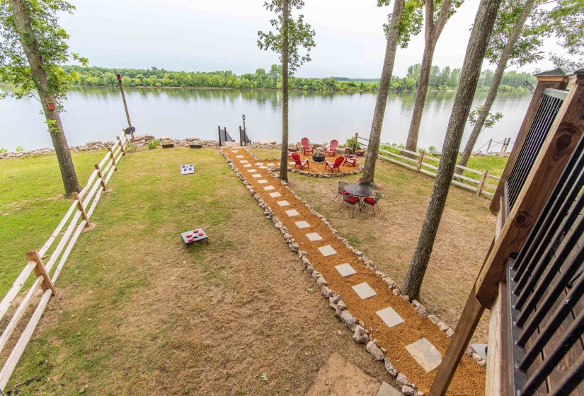 View of yard with a water view