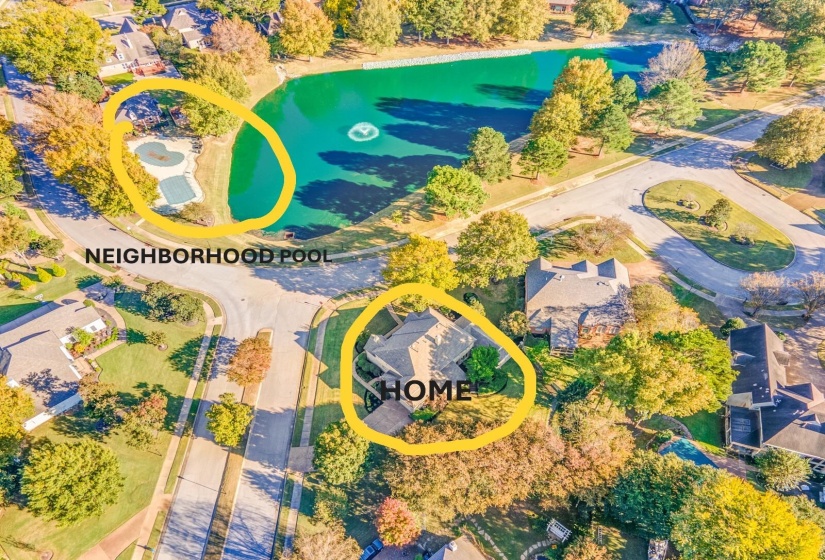 Aerial perspective showcasing the residential property within a neighborhood setting