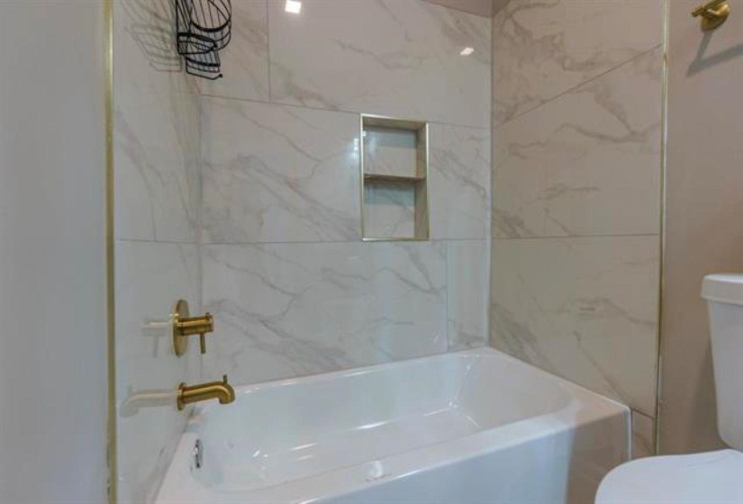 Bathroom with toilet and  shower combination