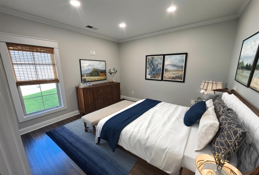 Bedroom with multiple windows, crown molding, wood finished floors, and recessed lighting