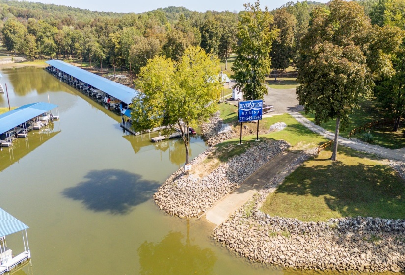 Aerial view of a large body of water and a heavily wooded area