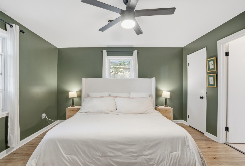 Bedroom featuring light wood-type flooring and a ceiling fan