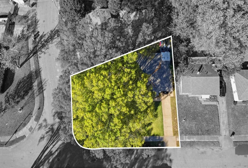 Aerial overview of property's location with property parcel outlined
