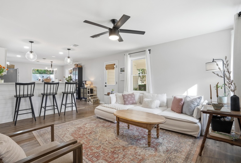 Living room featuring wood finished floors and recessed lighting