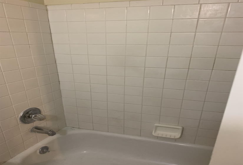 Full bathroom with  shower combination