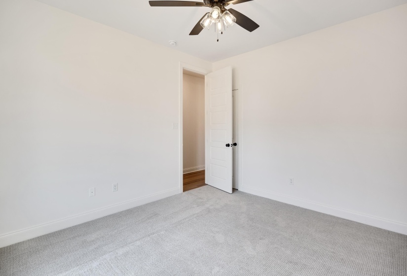 Another view of the downstairs bedroom.