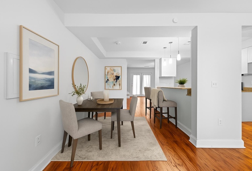 The convenient breakfast bar adds extra seating and workspace, ideal for casual dining, quick meals, or entertaining guests. This room has been virtually staged.