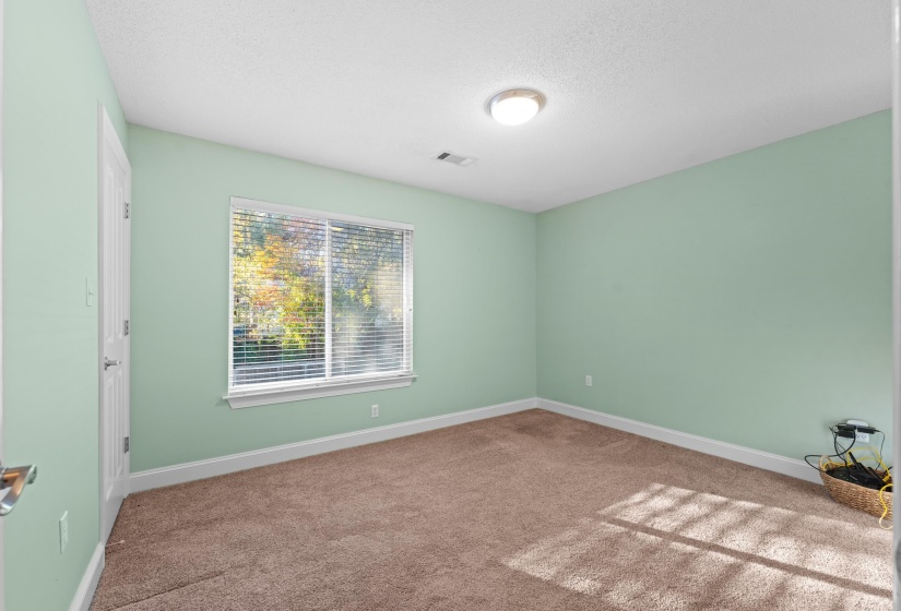 View of the second bedroom unfurnished.