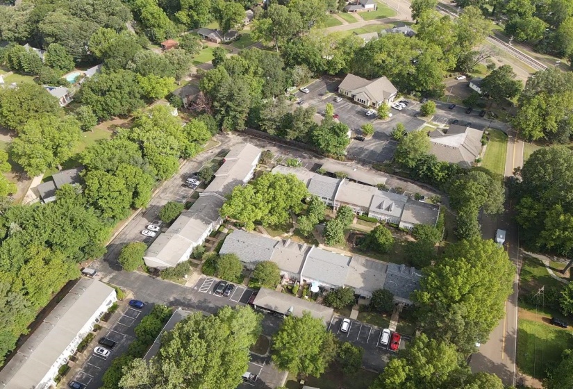 Capture the beauty of this well-maintained Germantown neighborhood from above. Tree-lined streets, manicured landscaping, and inviting exteriors showcase the charm and serenity of the community.