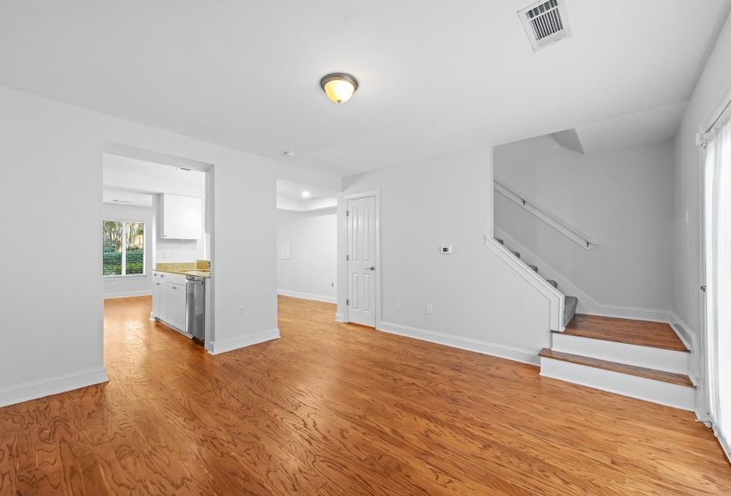 Filled with natural light and designed for flexibility, this dining area easily accommodates both casual breakfasts and formal dinners. Its proximity to the kitchen and living areas adds convenience and comfort.