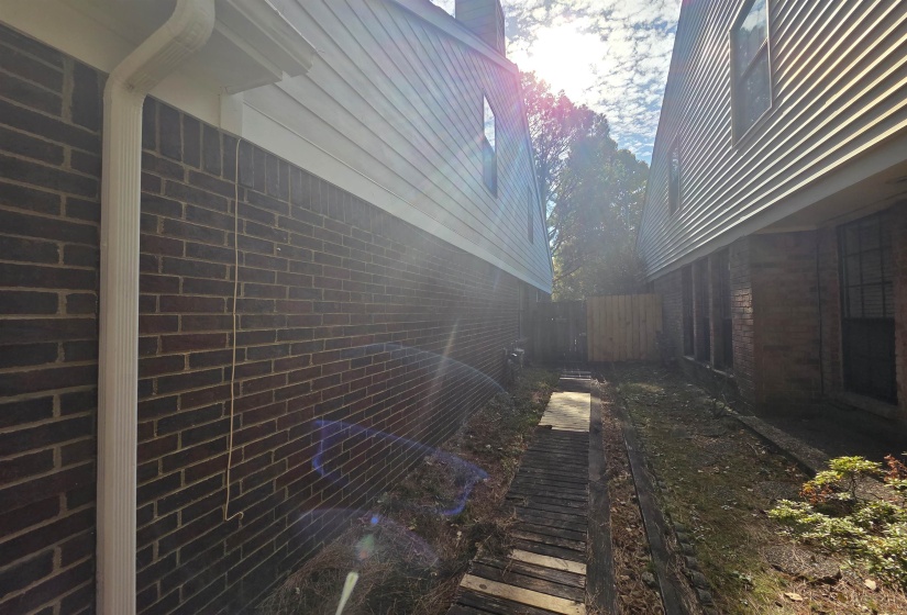 View of home's exterior featuring brick siding