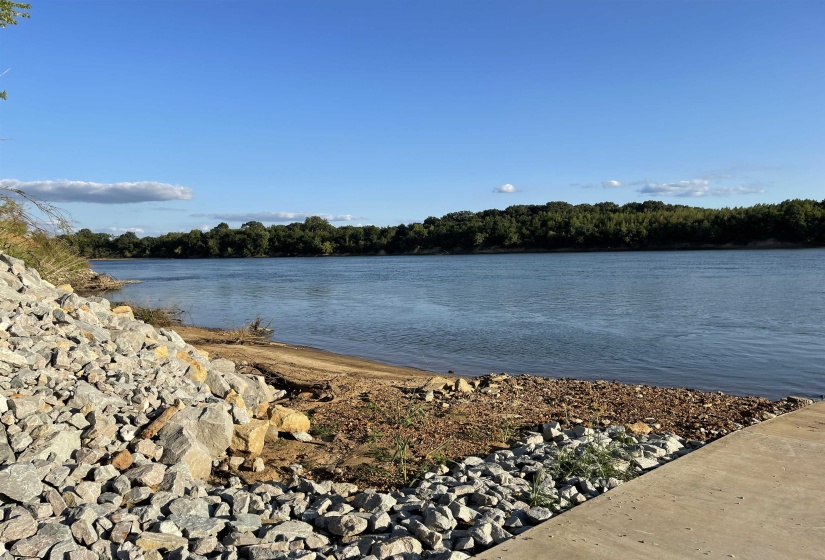 Water view featuring a heavily wooded area