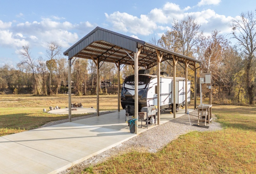 800 SF pole barn built in 2022 with a 2022 heartland Sundance lite 293RL.