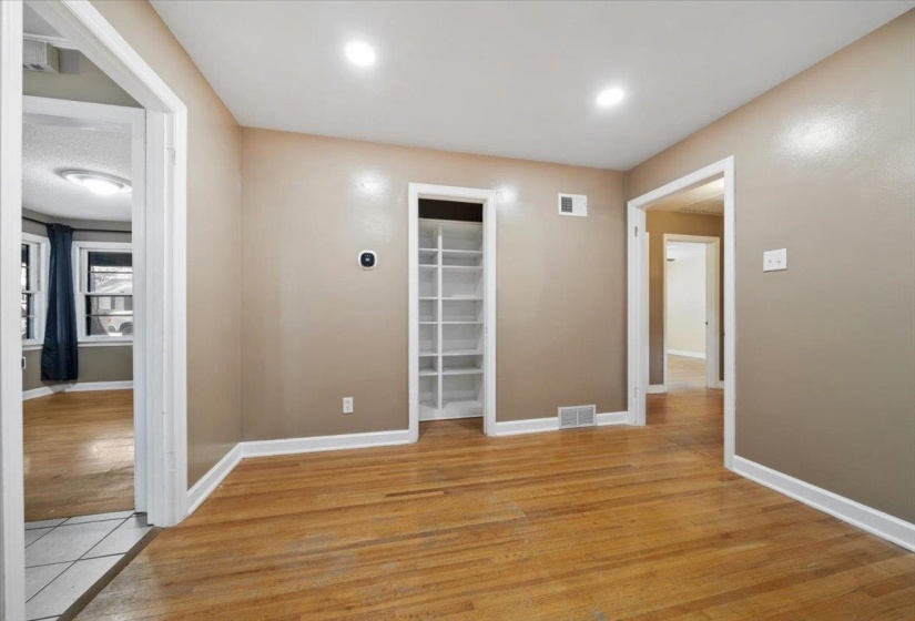 Corridor featuring light wood-type flooring