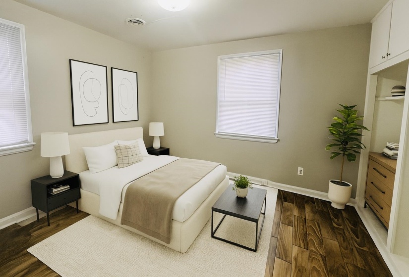 Bedroom with dark wood-style floors