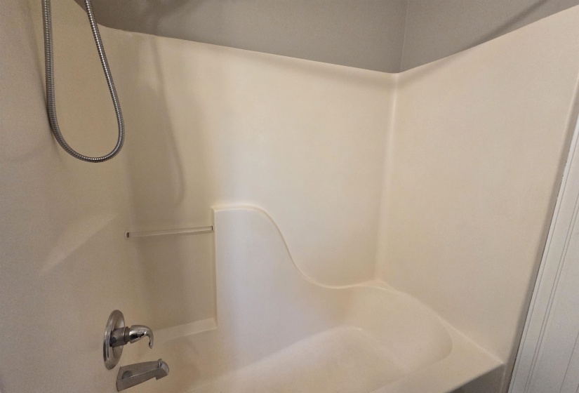 Bathroom featuring tub / shower combination