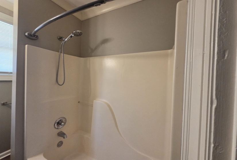 Full bath featuring shower / bathtub combination