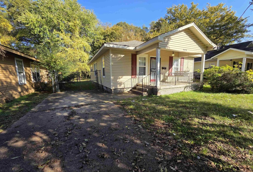 Bungalow-style house featuring a porch and a gate