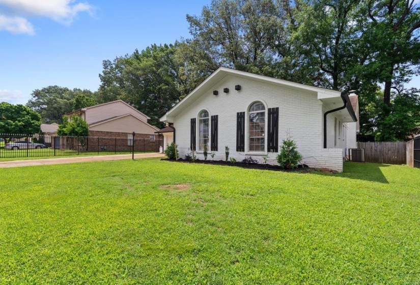 View of front of house with brick siding
