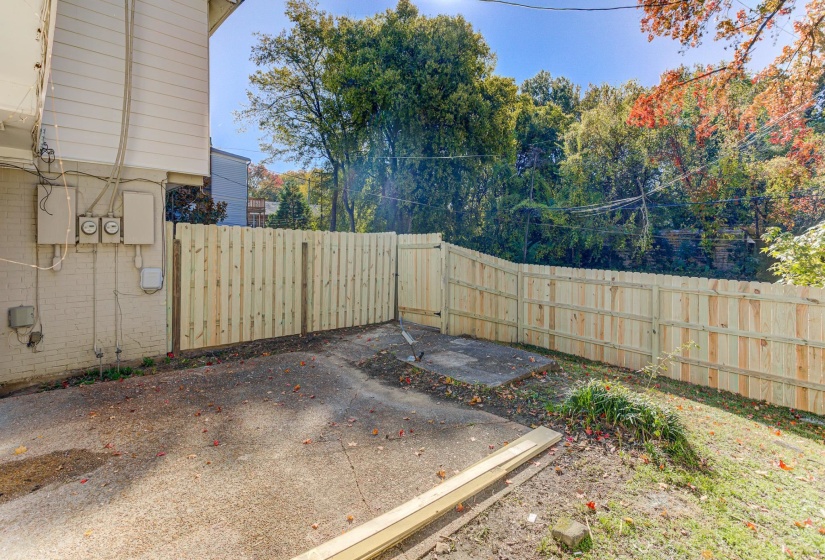 Fenced backyard featuring a patio