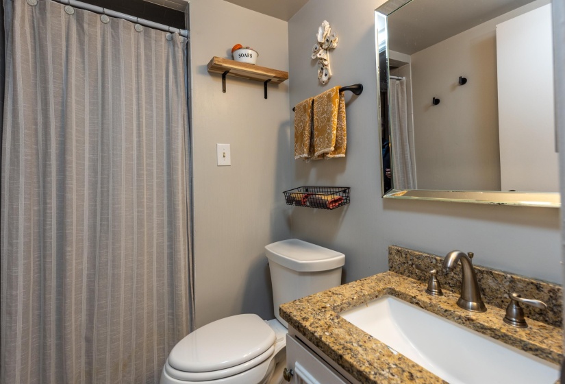 Former owner added a shower in the downstairs bath so the bonus room could comfortably house guests. It’s is also nice to have the 2 full baths.